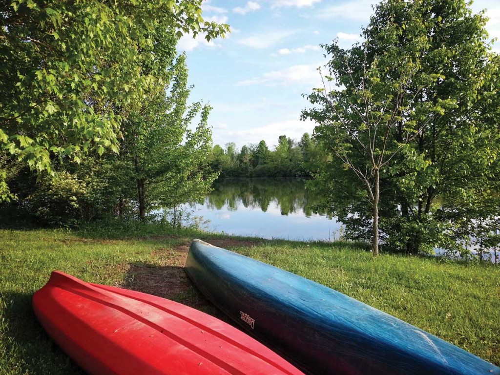 Canoes by the lake at Gaie Lea
